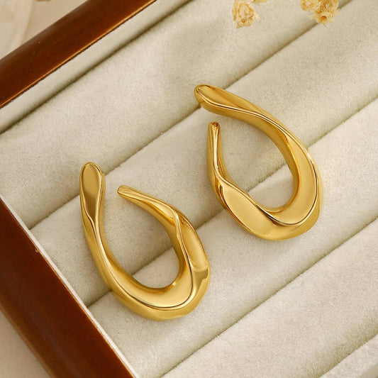 Minimal gold hoop earrings with sculpted curves, elegant statement hoops for women – Orlaya Jewellery