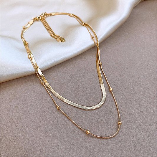 Layered gold necklace for women – office to evening wear
