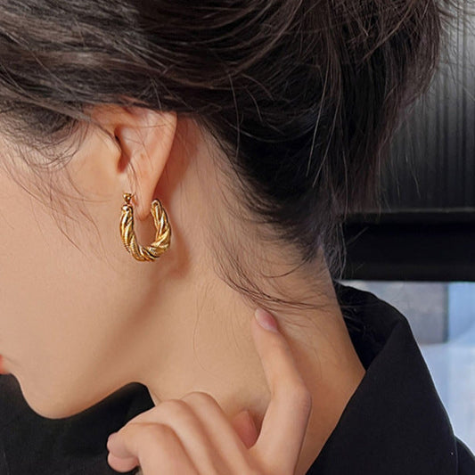 Model wearing Zehra Gold Hoops – Orlaya Jewellery gold hoops