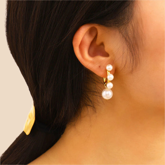 Pearl Cluster Gold Hoop Earrings worn by model, statement pearl jewellery for women, Orlaya Jewellery