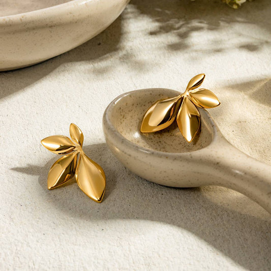 Verdure Gold Statement Earrings with sculpted leaf design – side angle Orlaya Jewellery