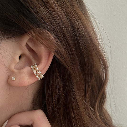 Model wearing Whisper Stacks sterling silver ear cuffs – Orlaya Jewellery