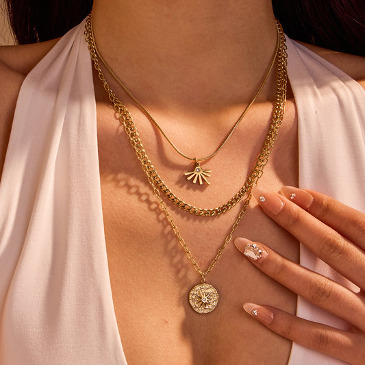 Goddess Necklace — layered sun medallion gold-tone necklace by Orlaya