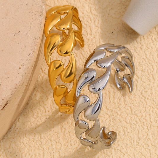 Aurora Drop Cuff Bracelet in gold with teardrop link design