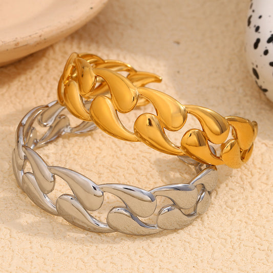 Orlaya Aurora Drop Cuff Bracelet crafted in 18K gold-plated steel