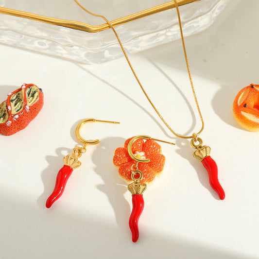 Calabria Charm gold earrings and necklace with red chilli charms – protective jewellery for women by Orlaya Jewellery