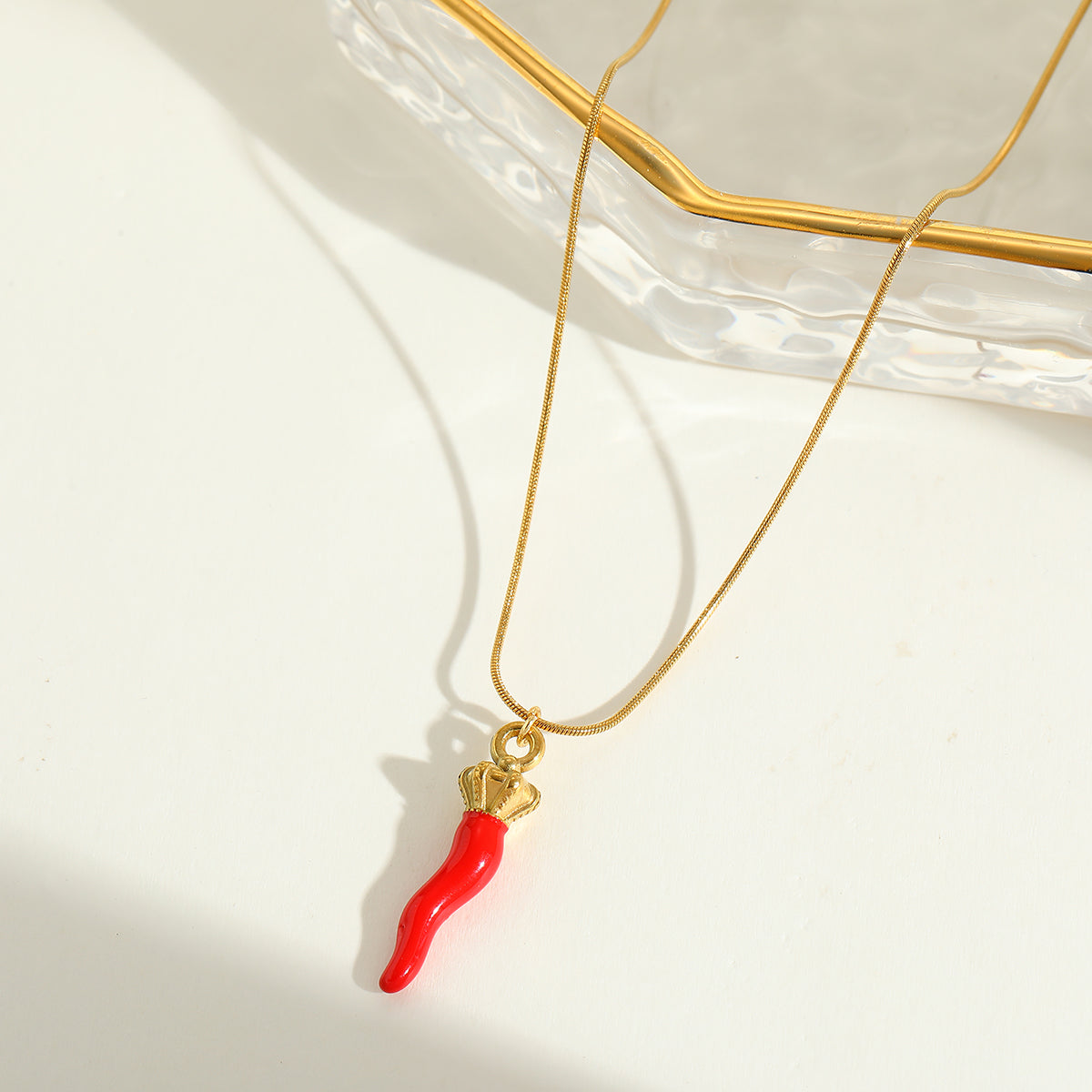 Calabria Charm gold necklace with red chilli charm – playful protective jewellery for women