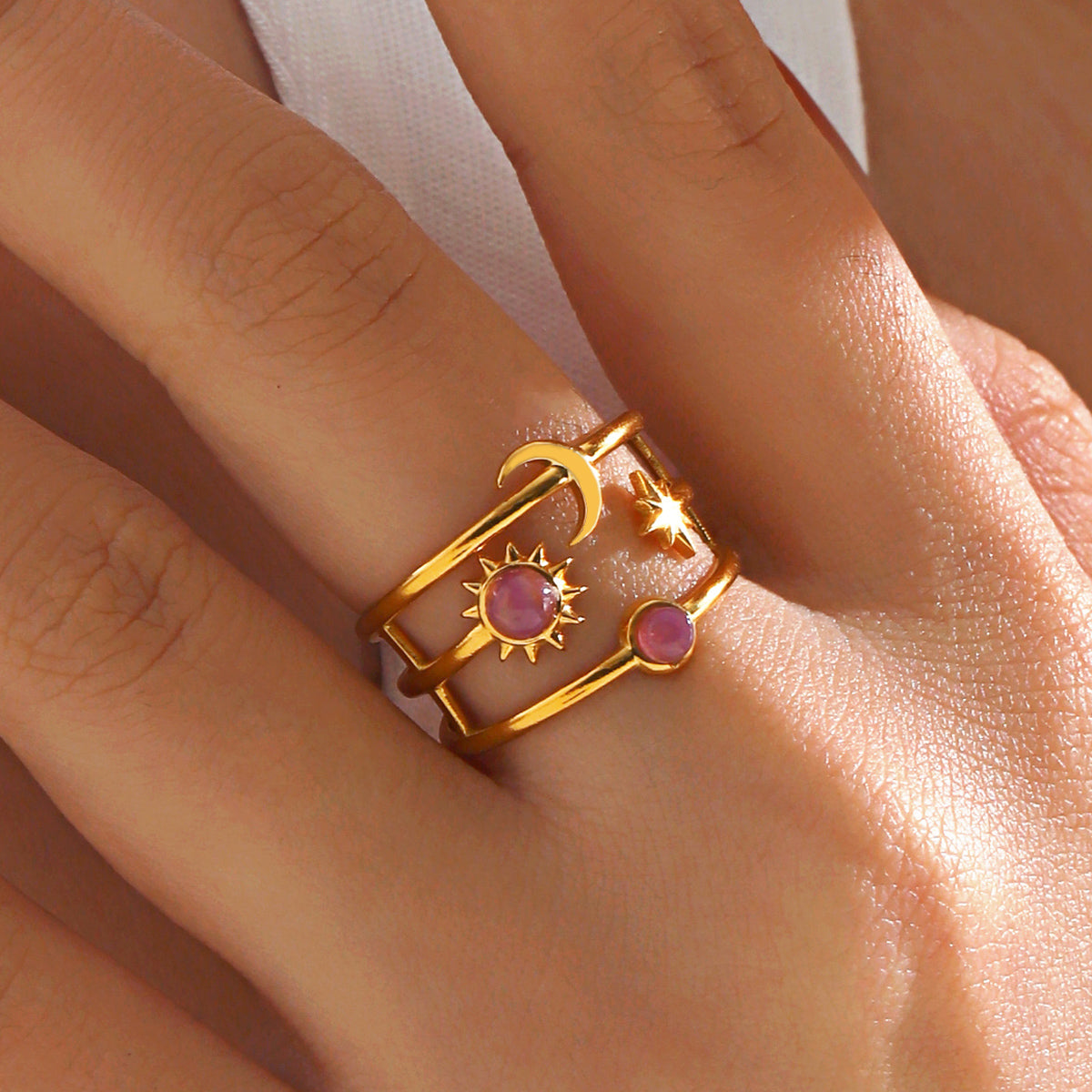 Celeste gold statement ring with celestial motifs  on hand – Orlaya Jewellery