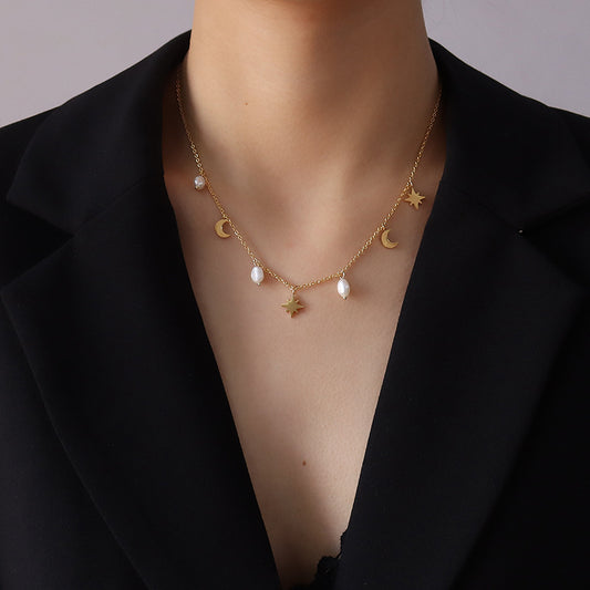 Celestial Charm Gold Choker Necklace with stars, moons, and pearls