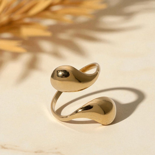 Modern sculptural gold ring with smooth drop silhouette Orlaya Jewellery