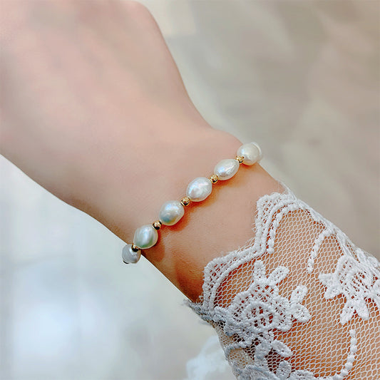 Pearline freshwater pearl bracelet with adjustable gold chain