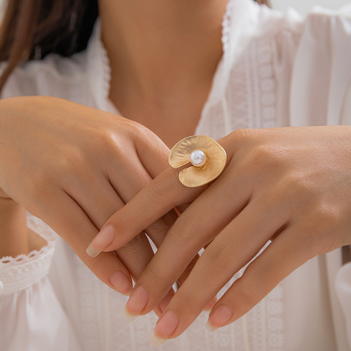Unique lotus-inspired pearl ring in warm gold finish – Orlaya Jewellery