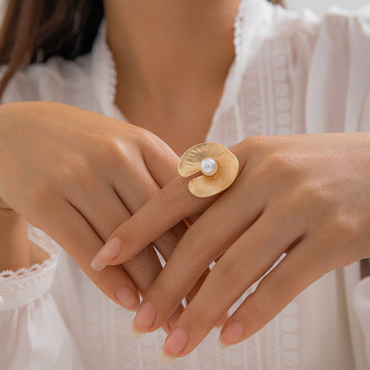 Unique lotus-inspired pearl ring in warm gold finish – Orlaya Jewellery