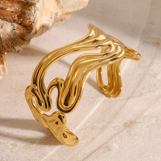 Close-up of Orlaya Luna Wave Cuff Bracelet with fluid curves