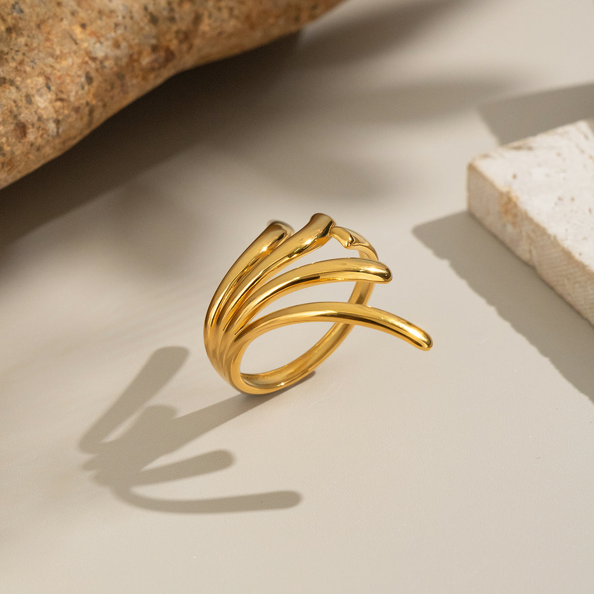 Contemporary gold fashion ring with bold statement silhouette Orlaya