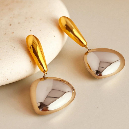 Close-up of Mono Amour Drop Earrings – gold arc with silver sphere, everyday luxe earrings by Orlaya Jewellery