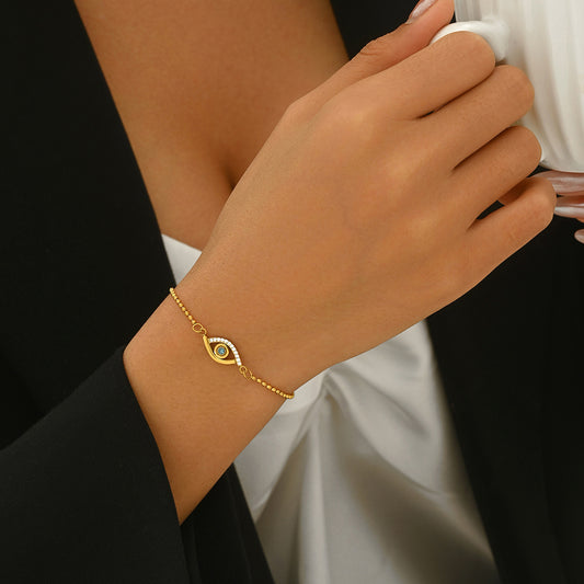 Nazar Evil Eye Bracelet in gold-plated finish with blue crystal charm
