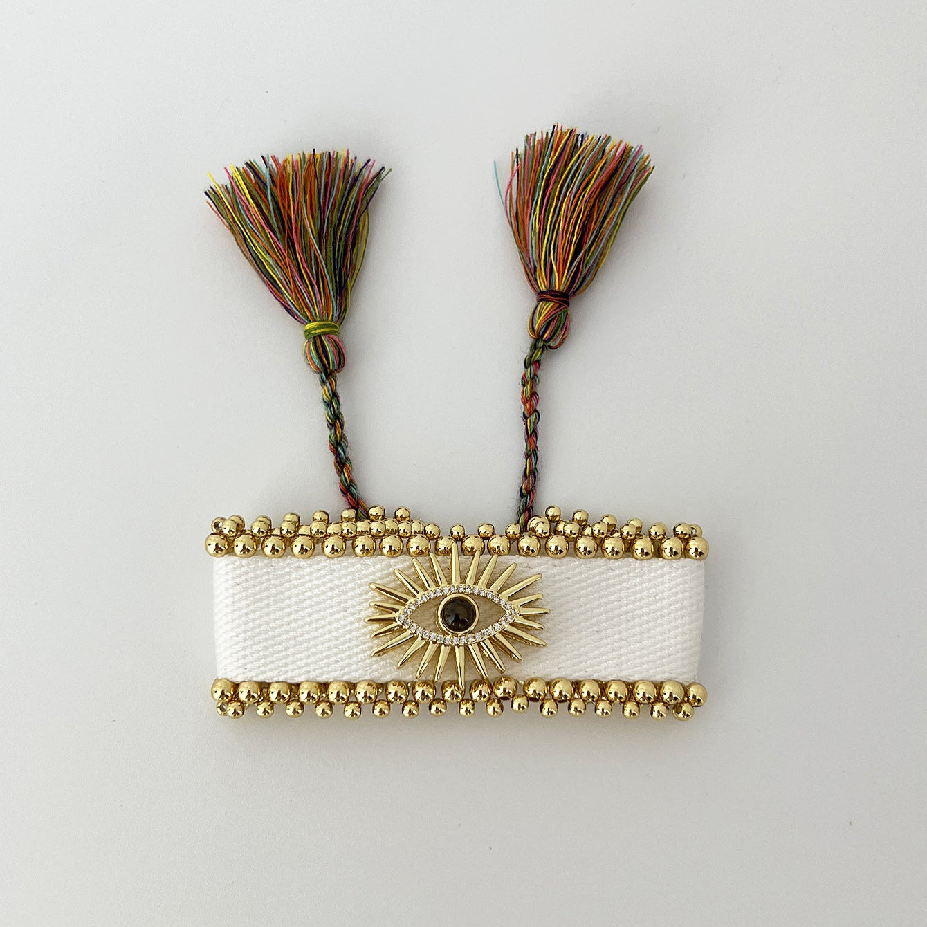 Nazar Veil bracelet in ivory gold with silk tassels