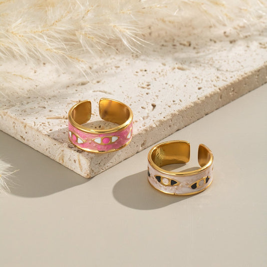 Orlaya gold plated evil eye rings in pink and white enamel finish