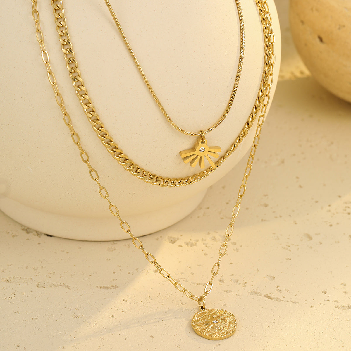 Gold layered necklace with radiant sun medallion pendant — Orlaya Jewellery