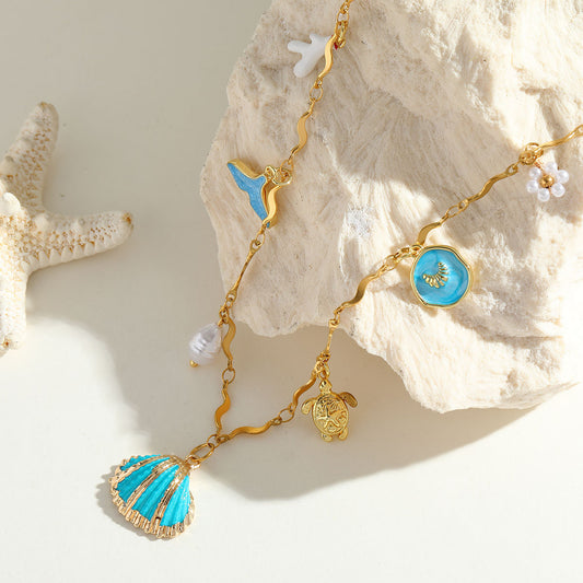 Holiday Drift Necklace — gold-plated ocean-inspired charm necklace by Orlaya Jewellery