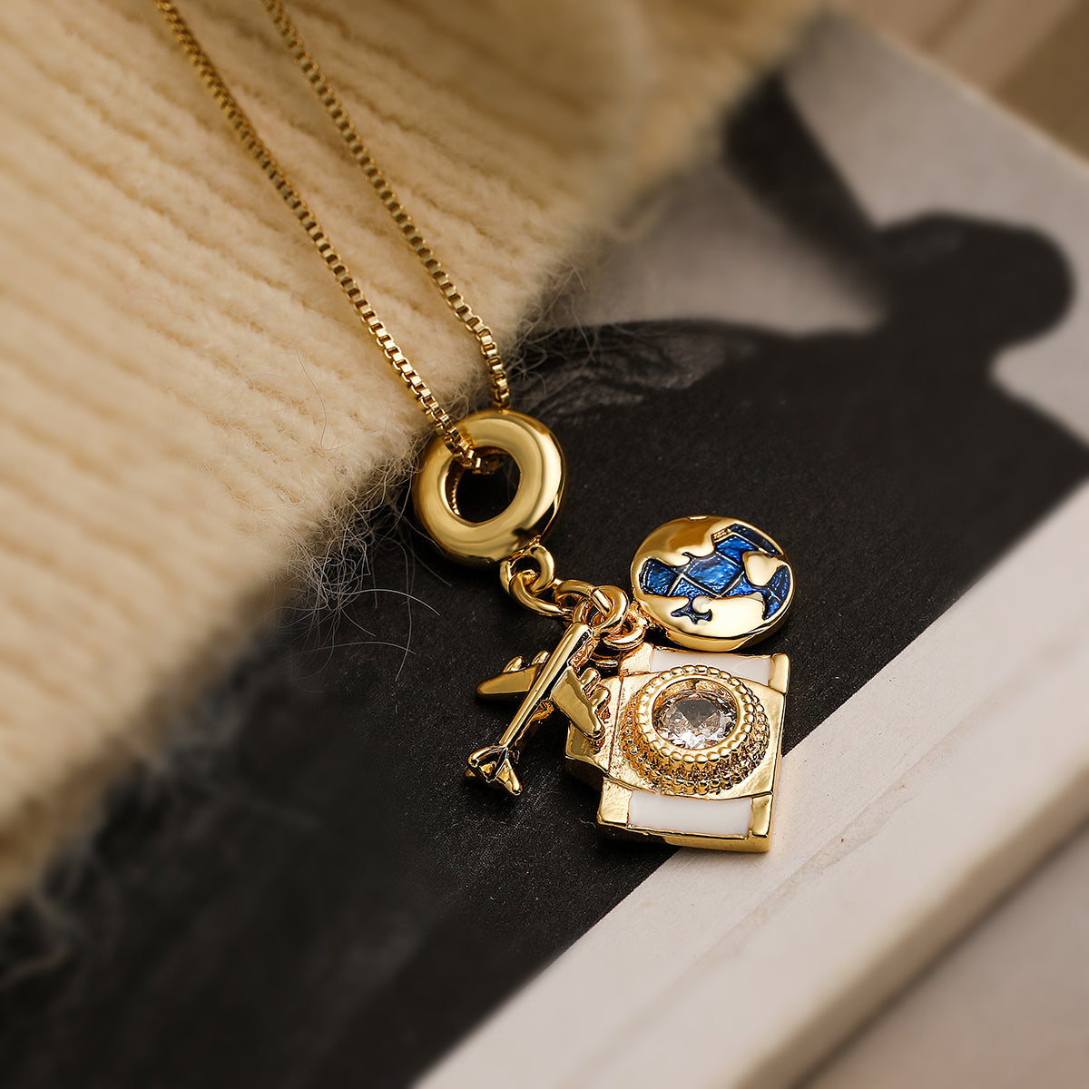 Jet Set Camera Necklace — travel charm gold necklace with globe pendant by Orlaya Jewellery