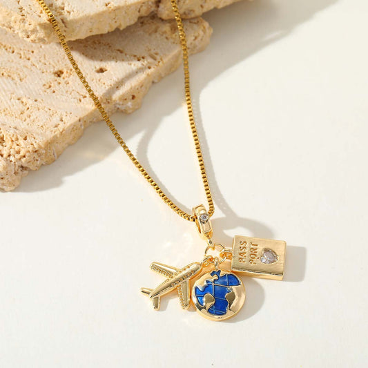 Jet Set Passport Necklace — travel charm gold necklace with globe pendant by Orlaya Jewellery