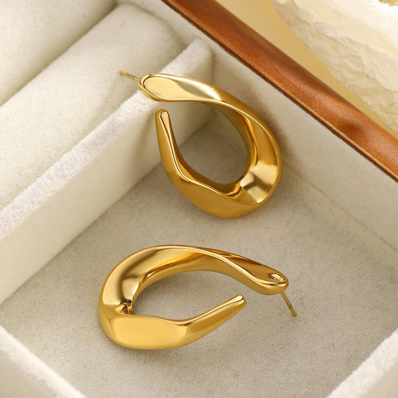 Ripple gold hoop earrings for women styled for everyday chic and party wear – Orlaya Jewellery