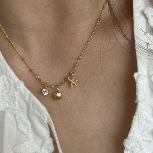 sea-whispers-gold-ocean-charm-necklace-01.jpg